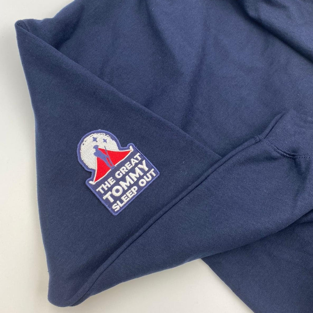 The Great TOmmy Sleep Out patch placed on a hoodie as an example of how you could use it.